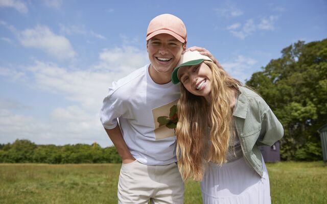 Mid Year Summer Launch Image showing a man and woman wearing Beechfield Caps