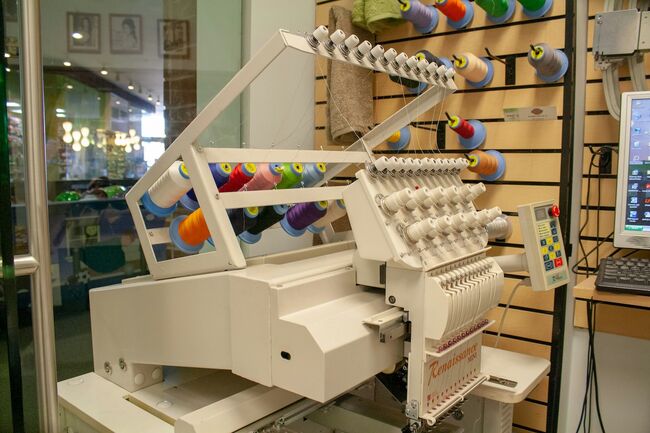 A machine with fabrics coming out of it