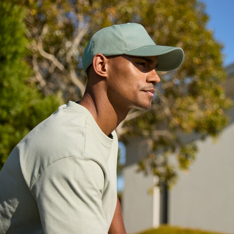 B62N EarthAware® Organic Cotton 5 Panel Cap in Dusty Green lifestyle shot